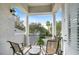 Upstairs balcony offering peaceful outdoor seating and a neighborhood view at 7419 Gathering Ct, Reunion, FL 34747