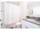 Clean bathroom featuring a white vanity with gray countertop and modern fixtures at 830 Sticks, Davenport, FL 33896