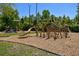 A vibrant playground area with modern play structures, safe surfacing, and surrounding greenery at 906 Blue Sage St, Kissimmee, FL 34747