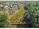 Overhead image of a nature trail with a wooden bridge, perfect for walking and enjoying the outdoors at 906 Blue Sage St, Kissimmee, FL 34747