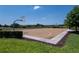 Outdoor community basketball court surrounded by greenery, perfect for recreational activities at 9149 Grand Island Way, Winter Garden, FL 34787