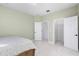 Bedroom featuring a bed, closet and doorways to other rooms at 9149 Grand Island Way, Winter Garden, FL 34787