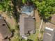 An aerial view shows the backyard pool and proximity to greenery at 936 Summer Lakes Dr, Orlando, FL 32835