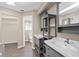 Bright bathroom with double vanities, modern fixtures, and ample storage space at 936 Summer Lakes Dr, Orlando, FL 32835