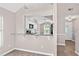 View of the kitchen with granite counters and stainless steel appliances at 936 Summer Lakes Dr, Orlando, FL 32835