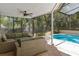 Inviting outdoor living space with screened lanai and sparkling pool at 936 Summer Lakes Dr, Orlando, FL 32835