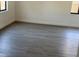 Clean bedroom with modern vinyl floors and natural light at 1059 Manigan Ave, Oviedo, FL 32765