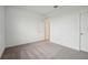 Neutral bedroom with gray carpet and white walls at 1210 Normandy Dr, Haines City, FL 33844