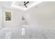 Bright bedroom featuring marble-style flooring and natural light at 1215 Crawford Ave, St Cloud, FL 34769