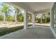 Covered patio with concrete flooring and backyard view at 1215 Crawford Ave, St Cloud, FL 34769