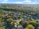 Aerial shot of the property's location, surrounded by lush trees and neighborhood amenities at 1601 Carillon Park Dr, Oviedo, FL 32765