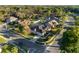 Aerial view showcasing the property's location and neighborhood layout in a well-landscaped community at 1601 Carillon Park Dr, Oviedo, FL 32765