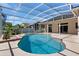 Inviting screened pool and patio area, perfect for outdoor enjoyment and relaxation at 1601 Carillon Park Dr, Oviedo, FL 32765