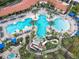 Aerial view of the community pool and splash pad offering hours of fun and relaxation at 1739 Oak Blossom Dr, Davenport, FL 33837