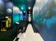 This room offers a custom bowling alley and arcade games set amongst a space-themed mural at 1739 Oak Blossom Dr, Davenport, FL 33837