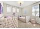 Charming bedroom designed with two beds, whimsical decor and decorative accents for a playful and cozy atmosphere at 1832 Sandy Park Trl, Kissimmee, FL 34747