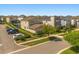 Street view of well-manicured homes, green lawns, and tree-lined streets in a residential neighborhood at 1832 Sandy Park Trl, Kissimmee, FL 34747