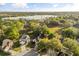 Aerial view of the neighborhood with tree lined streets at 1899 Valley Wood Way, Lake Mary, FL 32746