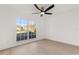 Bedroom with light wood flooring and a large window at 1899 Valley Wood Way, Lake Mary, FL 32746