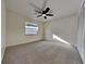 Bright bedroom featuring fan, closet, and natural light at 202 Ramsbury Ct, Longwood, FL 32779