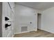 Bright hallway featuring new flooring, white walls, and modern hardware at 202 Ramsbury Ct, Longwood, FL 32779