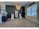 Formal dining room featuring elegant decor, large windows for natural light, and tile flooring at 2055 Quiet Cv, Sanford, FL 32771