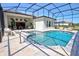 Stunning screened-in pool area, perfect for relaxing and entertaining guests in luxury at 2055 Quiet Cv, Sanford, FL 32771