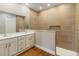Modern bathroom with double vanity, elegant tile shower, and contemporary finishes at 2341 Oleander Rd, Deland, FL 32724