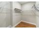 Organized walk-in closet with shelving and rod space for ample storage at 2341 Oleander Rd, Deland, FL 32724
