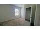 Bright bedroom with a window and a built-in closet at 2597 Shamrock St, Tavares, FL 32778