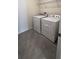 A simple laundry room with tile flooring and a washer and dryer at 2597 Shamrock St, Tavares, FL 32778