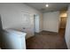 View of upstairs loft area leading to a bathroom at 2597 Shamrock St, Tavares, FL 32778