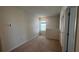 Upstairs loft area with carpeted floor and closet at 2597 Shamrock St, Tavares, FL 32778