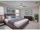 Serene bedroom featuring a king-size bed, neutral tones, and soft natural light at 2742 Rio Grande Trl, Kissimmee, FL 34741