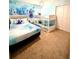 Charming bedroom with a fun Frozen theme, bunk beds, and a whimsical aesthetic at 3044 Mahalo Dr, Davenport, FL 33897