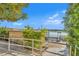 Dock and ramp leading to the water with views of a calm lake at 311 E Morse Blvd # 6-7, Winter Park, FL 32789