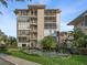 Stunning condominium building with beautiful landscaping, fountain, and secure access for elegant living at 311 E Morse Blvd # 6-7, Winter Park, FL 32789