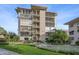 Exterior view of a well maintained condo building with a water feature at 311 E Morse Blvd # 6-7, Winter Park, FL 32789