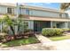 Charming townhouse featuring well-maintained landscaping and a screened-in porch at 40 Moree Loop # 11, Winter Springs, FL 32708