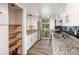 Eat-in kitchen featuring granite countertops, stainless steel appliances, and a pantry at 40 Moree Loop # 11, Winter Springs, FL 32708