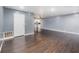 Open-concept living area featuring wood floors and plenty of natural light at 40 Moree Loop # 11, Winter Springs, FL 32708