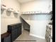 Spacious walk-in closet with carpet, shelving and storage drawers for optimal organization at 4418 Lions Gate Ave, Clermont, FL 34711