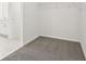 Walk-in closet with carpet flooring and wire shelving for optimal storage solutions in a modern design at 4544 Windy Oak Way, St Cloud, FL 34772