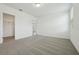 A bright bedroom with soft carpet, natural light, and closet at 4550 Windy Oak Way, St Cloud, FL 34772
