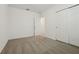 Cozy bedroom with closet and natural lighting, neutral carpet flooring at 4550 Windy Oak Way, St Cloud, FL 34772