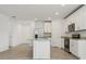Modern kitchen with an island, stainless steel appliances, and granite countertops at 4550 Windy Oak Way, St Cloud, FL 34772