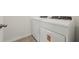 Laundry area with modern appliances, including a washer and dryer at 4550 Windy Oak Way, St Cloud, FL 34772
