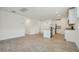 Bright open floor plan showcases a spacious layout connecting the kitchen, and living area at 4550 Windy Oak Way, St Cloud, FL 34772