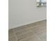 Neutral tile flooring throughout the home adds warmth and style at 4550 Windy Oak Way, St Cloud, FL 34772
