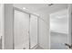 Bathroom featuring glass shower with white tile, neutral colored floor, and white walls at 4556 Windy Oak Way, St Cloud, FL 34772